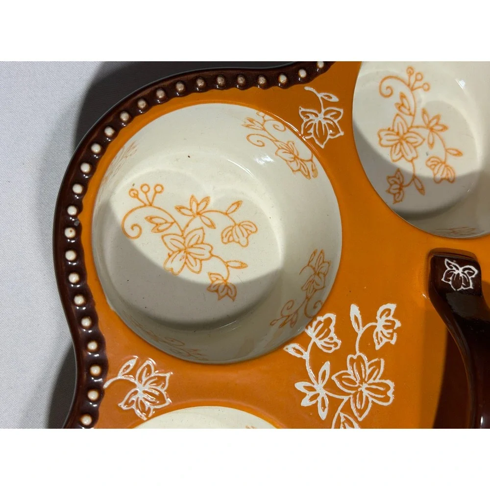 Temp-tations Floral Lace Orange Ceramic 6-Cup Muffin Pan with Handle Bakeware